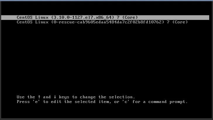 GRUB bootloader initial boot screen for CentOS 7 Core kernel 3.10.0-1127.el7.x86_64 on x86_64 architecture. The terminal shows the login prompt ‘vm-1-fq4tx8z0 login:’ with a blinking cursor, awaiting user input.